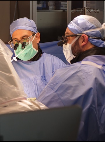 Iahn Cajigas, MD operating on a patient and performing Deep Brain Stimulation.